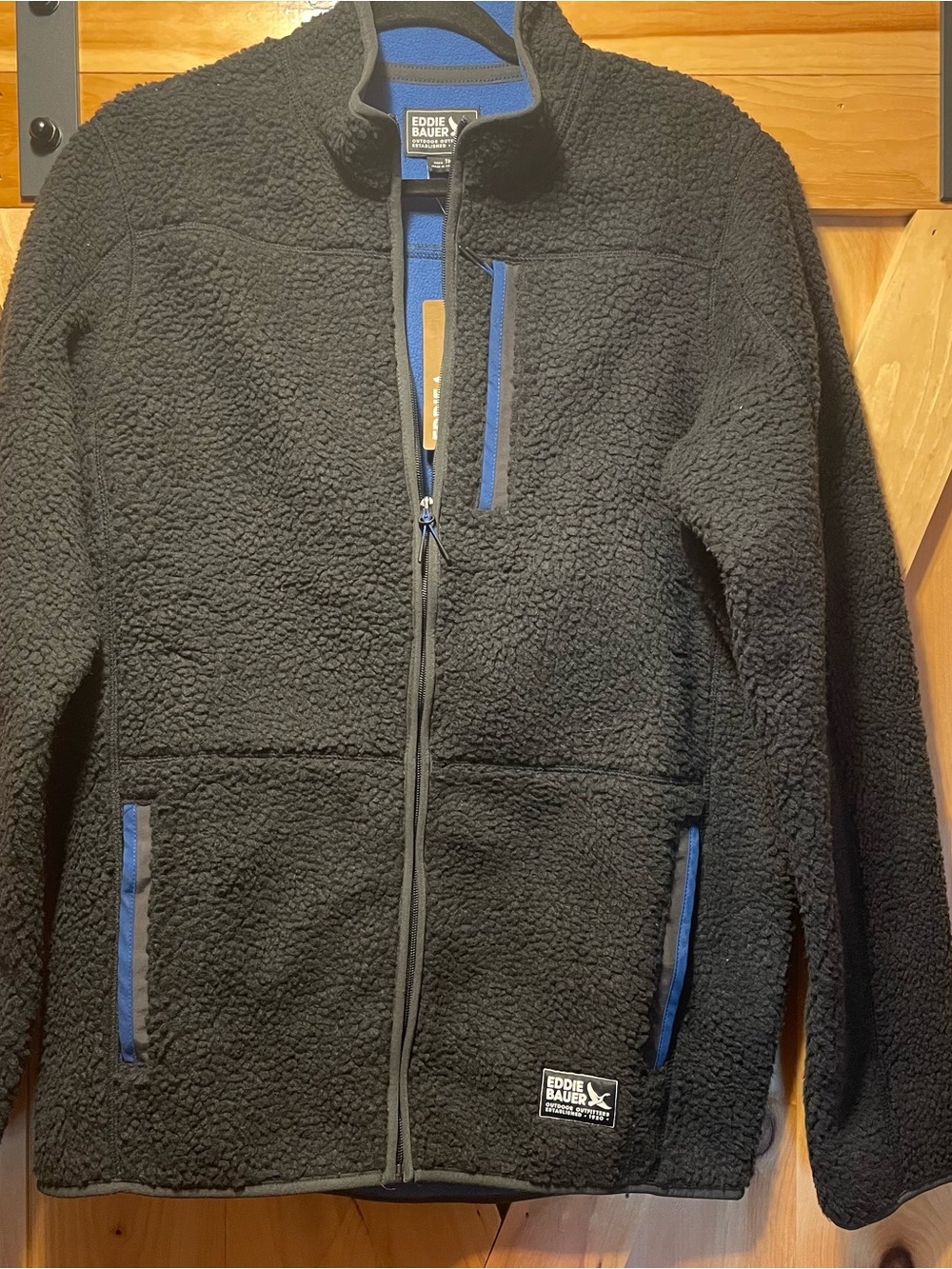 Eddie Bauer Black Sherpa Jacket with Blue Trim, new, men’s medium tall